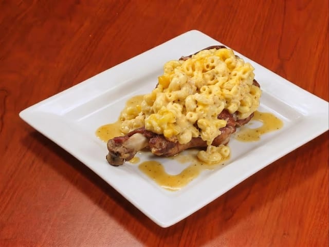 Stuffed Smoked Turkey Leg with Mac N Cheese.